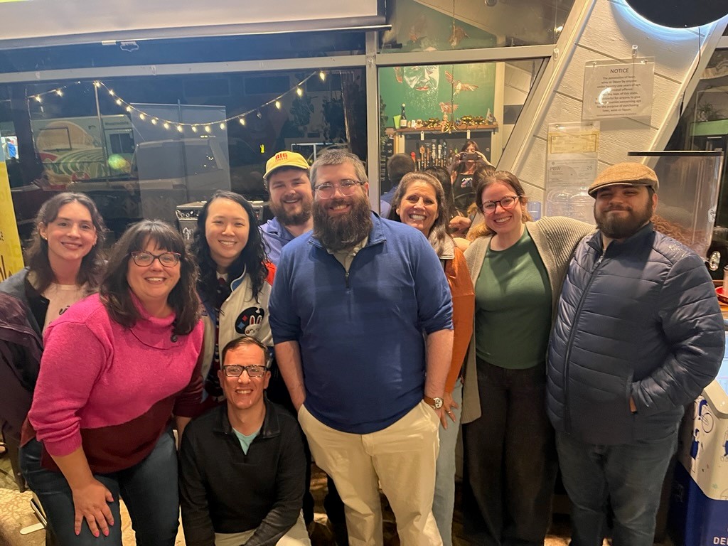 Able SC Greenville staff pose in a group at Grateful Brew.