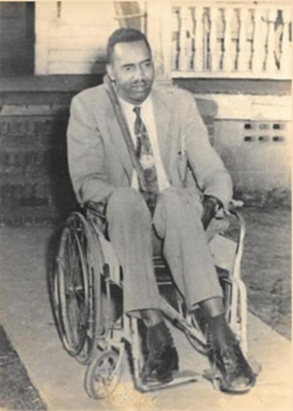 black and white photo of Ivory, a black man in a wheelchair. Photo from the 1960s