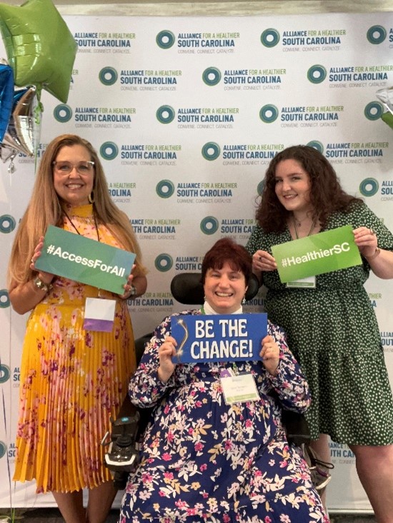 Able SC Stretch team members celebrate after presenting at the 2024 Health Equity Conference hosted by Alliance for a Healthier SC